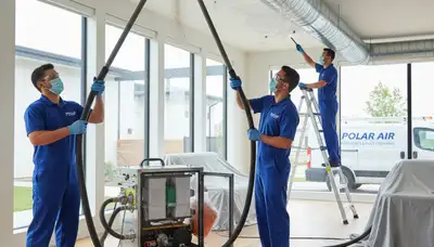 Technician cleaning air ducts for AC system in El Paso TX home | Five Star Cooling air duct service